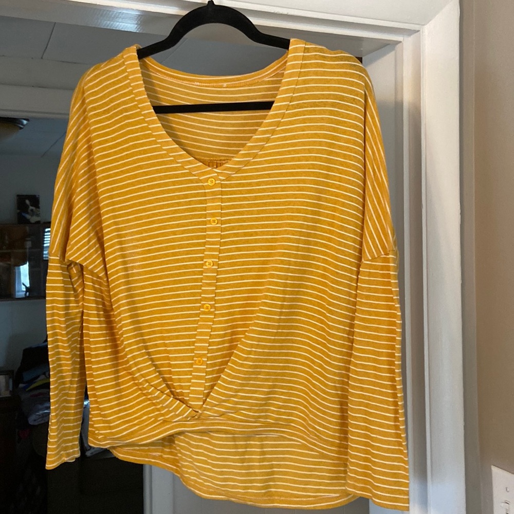 Long sleeve shirt size small.  Gold color.